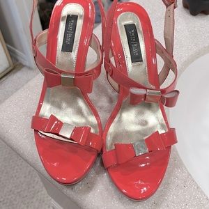 WHBM Coral colored 4" wedges with gold tone details. Near new condition Sz 7 1/2